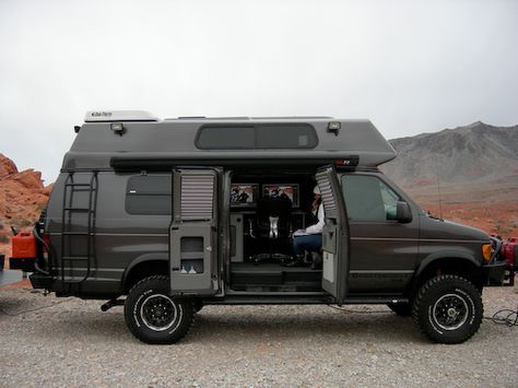 Grey van . voyager top . with Aluminess ladder and rear bumper with swing outs Camping Vans, Grey Vans, 4x4 Camper Van, Kombi Motorhome, 4x4 Van, Expedition Truck, Bug Out Vehicle, Ford Van, Travel Van