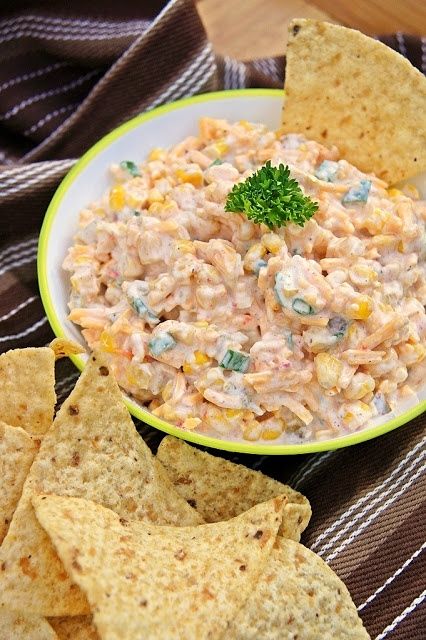 Cowboy Corn Dip: 3 cans sweet corn with diced peppers, drained (also called Fiesta corn...11 oz each) 1 can chopped green chilies (7 oz) 1 can chopped jalapeno peppers, drained (6 oz) 1/2 cup green onions, chopped 1 cup mayonnaise 1 cup sour cream 1 teaspoon pepper 1/2 teaspoon garlic powder 1 package shredded sharp cheddar cheese (16 oz) 2-3 bags of Frito Scoops. Cowboy Corn Dip, Cowboy Corn, Macncheese Recipe, Fiesta Dip, Corn Dip Recipes, Canning Sweet Corn, Jalapeno Peppers, Corn Dip, S'mores