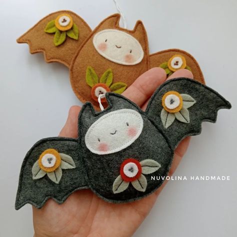 Summer is for designing new Halloween (and Christmas🎄🎅🏼) ornaments 🦇🎃 I'm not a fan of spooky things though, I much prefer cuteness (who would ever have guessed).The pattern is already in the shop, link in bio.🦇 . . #halloween #autumn #feltbat #notsospooky #handmade #sewingpattern #pdfpattern #halloweenornaments #cutehalloween Felt Crafts Diy Sewing Patterns, Felt Halloween Decorations, Fall Felt Crafts, Felt Halloween Ornaments, Felt Bat, Halloween Felt Crafts, Halloween Crafts To Sell, Mascaras Halloween, Felt Ornaments Patterns