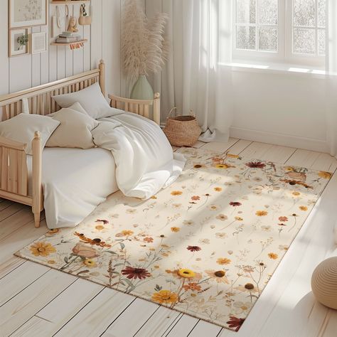 Rectangle Wildflowers Personalized Area Rug, Baby room rug, beige area rug wildflowers theme baby Nursery rug, baby carpet ♥ WHY THIS WILDFLOWERS RUG IS A GREAT BUY? This beautiful Woodland Area Rug is perfect for adding a touch of warmth and coziness to your baby's nursery. The subtle design features delicate colors and patterns that are sure to complement any décor. Made from high-quality materials, this rug is soft and inviting, making it the perfect place for your little one to play or crawl around. Don't forget to complete the look with matching bedding sets from Empowering Decor. ♥ DETAILS - Material(top): polyester; Material(bottom): dotted rubber plastic + oxford fabric. - It looks perfect for living room, bedroom and can be used for home decor. - Anti-slip backing. High quality ep Wildflowers Nursery Theme, Wild Flower Nursery Theme, Wildflower Nursery Theme, Flower Nursery Theme, Baby Nursery Rug, Wild Flower Nursery, Little Rugs, Vintage Floral Nursery, Daisy Room