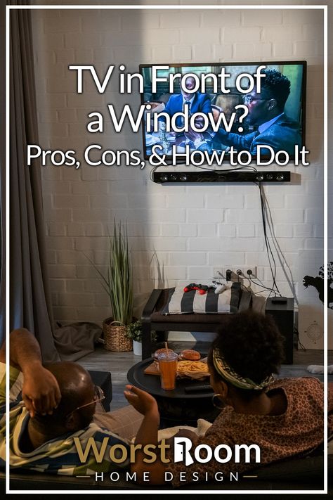 TV in Front of a Window? Pros, Cons, & How to Do It Tv Stand In Front Of Window Living Room, Curtain Wall Behind Tv, Tvs In Front Of Windows, Tv Opposite Window, Tv Across From Window, Tv In Front Of Curtains, Tv Unit In Front Of Window, Tv Near Window, Tv By Window