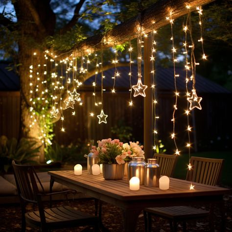 backyard christmas - branches with stars Outdoor Star Lights, Outdoor Christmas Lights On Trees Night, Garden With Fairy Lights Night, Bistro Lights In Trees, Outdoor Star Christmas Lights, Pergola Decorations, Christmas Branches, Wedding Backdrop Decorations, Wedding Backdrop Design