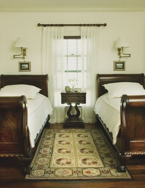 Matching mahogany sleigh beds and a lyre-base mahogany table are American Empire pieces selected for this second guest room with adjoining half bath. Wrightsville Beach Magazine Sept 2007 Chadsworth Cottage, Residential, Interior Figure Eight Island Photography: Joshua Curry http://columnsphoto.com/proddetail.asp?prod=9000-1357-00# Twin Sleigh Beds Guest Room, Twin Sleigh Bed, Lake House Bedroom, Historical Interior, Empire Furniture, Ethnic Home Decor, Elegant Bedding, French Country Bedrooms, Elegant Curtains