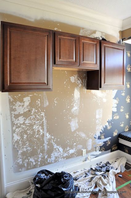 Painting Builder Grade Cabinets - Evolution of Style Painting Builder Grade Cabinets, Builder Grade Kitchen Makeover, Builder Grade Cabinets, Builder Grade Kitchen, Dark Brown Cabinets, So Far So Good, Penny Tile, Oak Kitchen Cabinets, Builder Grade