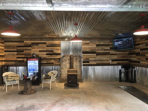 Corrugated Tin Ceiling Basement, Garage Walls Wood Boards & Planks, Pallet Wood Garage Walls, Easy Basement Wall Ideas, Tin Sheets On Wall, Pallet Garage Wall, Pallet Wall Garage, Tin And Pallet Walls, Tin And Shiplap Walls