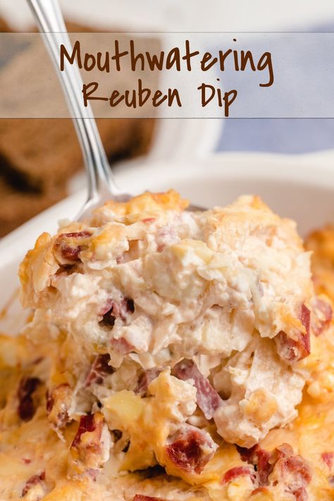 Hot and cheesy Reuben Dip has all the flavors of a favorite diner sandwich - corned beef, sharp and crunchy sauerkraut, Swiss cheese and sweet and tangy condiment base. Scoop it up with slices of rye, pumpernickel or your favorite white bread.   via @cmpollak1 Rueben Dip, Pig Recipes, Salmon Dip Recipes, Reuben Sandwich Classic, Reuben Dip, Beef Dip, Dessert Waffles, Deli Sandwiches, Bacon Sausage