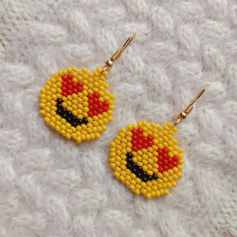 Heart Eyes Emoji Beaded Earrings 😍 SOLD ♥️ #hearteyesemoji #heartearrings #emojiearrings #emojijewellery #emojijewelry #handmadeearrings  #handembroidery #embroideryearrings  #embroideredjewelry   #embroiderydesign  #embroideryart #beadedearrings  #beadedjewelry  #jewlerydesign #needlecraft #vintagefashion  #anchorthreads  #wearableart  #earringlove  #artlove #anchorlove #etsyshop #etsyseller  #etsykenya #nairobikenya #kenyanart #vocalforlocal  #supportsmallbusiness  #madewithlove Emoji Jewelry, Heart Eyes Emoji, Emoji Heart, Emoji Earrings, Instagram Heart, Red Heart Earrings, Eyes Emoji, Heart Earring, Yellow Jewelry