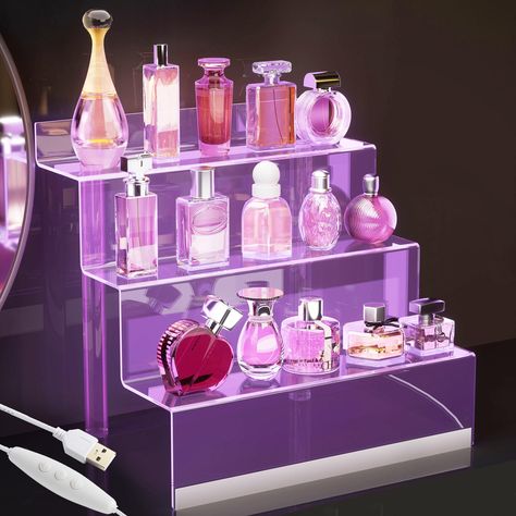 PRICES MAY VARY. WITH LED COLOR-CHANGING 10 OPTIONS TO MATCH EVERY MOOD: Light up the atmosphere in your room with an array of color-changing options. ELEGANT TRANSPARENCY STAND: Elevate the presentation of fragrance collections organizer with acrylic display shelves, offering a clear showcase for perfume bottles. The perfume holder organizers and 3-tier acrylic risers contribute to a display stand of cologne and perfume. VERSATILE CONFIGURATIONS: Explore adaptability through acrylic risers disp Perfume Stand Display, Cologne Organizer For Men, Cologne Organizer, Collection Display Shelves, Display Shelves Decor, Lotion Organization, Acrylic Cupcake Stand, Step Shelves, Perfume Stand