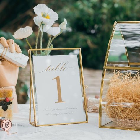 This Wedding Table Numbers item by NCYPGarden has 2688 favorites from Etsy shoppers. Ships from Bell Gardens, CA. Listed on Dec 28, 2023 Gold Card Box Wedding, Bouquet Frame, Gold Table Number, Olive Oil Favors, Gold Table Numbers Wedding, Table Number Holder, Marco Vintage, Wedding Swag, Outdoor Garden Wedding