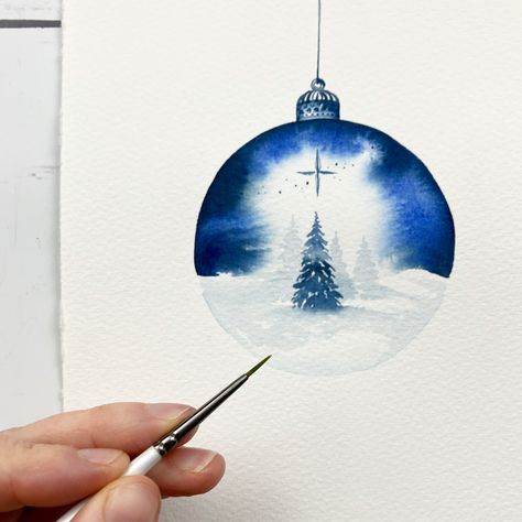 Paint a simple blue bauble with my new watercolour tutorial. A perfect christmas card design for beginners. Click the link to watch! #watercolour #watercolor #christmascardsdiy #cardmaking #christmas #christmascraft Watercolor Christmas Cards Baubles, Christmas Bauble Watercolour, Ornament Watercolor Painting, Christmas Card Watercolour Ideas, Christmas Baubles Painting, Water Colour Christmas Cards Ideas, Watercolour Baubles, Watercolor Christmas Cards Ideas Simple, Simple Watercolor Cards