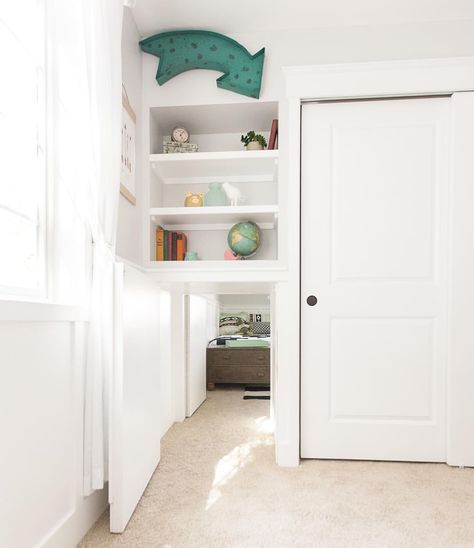 Here's a shot of the secret tunnel between bedrooms. This was an idea our kids thought of that we were able to incorporate into the house. We slightly modified the bedroom closet to accommodate the tunnel. The doors on each end were "disguised" with wainscot trim and secured with magnetic spring latches. It was a seamless look that only revealed the hidden tunnel when the doors were opened. Hours of fun for children (and adults too)! #hgtv #lovehgtv #hgtvrafterhouse Secret Rooms In Houses, Hidden Tunnel, Wainscoting Bedroom, Secret Passage, Kids Door, Bear Bed, Dining Room Wainscoting, Wainscoting Styles, Small Bedroom Remodel