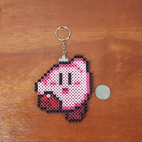 Take Kirby On The Go And Power Up This Kirby Perler Bead Sprite Can Be Hung On A Wall And Can Get Wet So It's Great Addition For Your Keys, Purse, Book Bag And Backpacks Etc. Height 4" Width 3 1/2" Professional Seller, Packaged With Care, Same Or Next Day Shipping With All Priority Mail Packaging So You Can Shop Confidently With Us! Bundle More Than 1 Item And Save On Shipping. Measurements Are Taken Flat And Are Approximate. Reasonable Offers Accepted. Thank You For Checking Out Our Closet. Hav Book Perler Beads, Kirby Perler Bead Patterns, Kirby Perler Beads, Perler Wall, Kirby Keychain, Sprite Can, Melty Bead Designs, Mail Packaging, Perler Designs