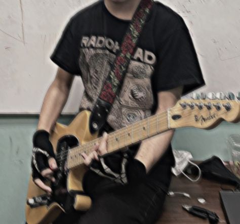 alt boy holding a guitar wearing a radiohead shirt Rockstar Man Aesthetic, Electric Guitar Boy Aesthetic, Guitar Band Aesthetic, Male Guitarist Aesthetic, Band Boy Aesthetic, Rockstar Boy Aesthetic, Rock Boy Aesthetic, Band Aesthetic Rock, Rockstar Aesthetic Men