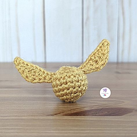 This is a Harry Potter inspired Golden Snitch Amigurumi pattern and Video Tutorial. Pattern Details: Size of Amigurumi: 1 inch Difficulty Level: Basic Beginner Terms: US Yarn: Medium Hook: 2.75mm Hope you enjoy the pattern. Do share your pictures with me. Crochet Golden Snitch Keychain, Crochet Harry Potter Ornaments, Golden Snitch Crochet Pattern Free, Crochet Golden Snitch, Goose Berry, Classifying Animals, Harry Potter Amigurumi, Crochet Harry Potter, Harry Potter Keychain