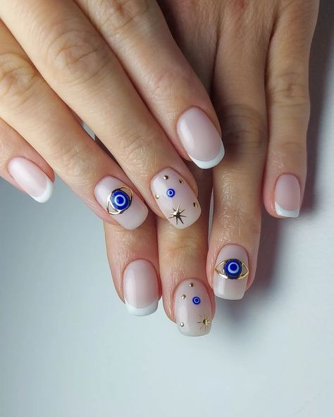 Discover 22 captivating Evil Eye nail designs! Dive into this trending nail art and learn how to DIY for a touch of mystique and style. Unveil your inner enchantress! Click the article link for more photos and inspiration like this // Photo Credit: Instagram @jark.nails // #acrylicnails #acrylicnailsstyles #bestnailstyles #elegantnails #evileyemanicure #evileyenail #evileyenaildesigns #evileyenailideas Glitter Evil Eye Nails, Evil Eye Nails Design Short, Evil Eye Short Nail Designs, Spiritual Nails Designs Short, Evil Eye Square Nails, Greek Eye Nail Art, Lucky Eye Nails, Evil Eye Nail Art Design, Fortune Teller Nails