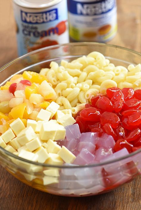 Fruit Salad with pasta and sweetened is the ultimate party dessert. This Filipino salad is creamy, tasty and sure to a crowd favorite. Macaroni Fruit Salad Filipino, Filipino Macaroni Fruit Salad Recipe, Macaroni Fruit Salad Recipe, Macaroni Fruit Salad, Filipino Salad, Rose Desserts, Filipino Desert, Filipino Fruit Salad, Chicken Sisig