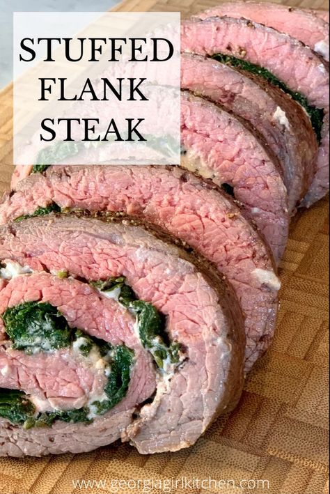 Stuffed Flank Steak is a perfect meal for any special occasion! This beautiful main course is a tenderized flank steak stuffed with goat cheese, mushrooms, and spinach. Grill it or bake it for a sophisticated, delicious dinner! #flanksteak #holidayrecipe #christmasdinner #entertaining #beefrecipesfordinner #georgiagirlkitchen Flank Steak Stuffed, Stuffed Flank Steak, Beef Flank Steak, Flank Steak Recipes, Garlic Spinach, Grilled Dinner, Holiday Meals, Holiday Meal, Potluck Recipes