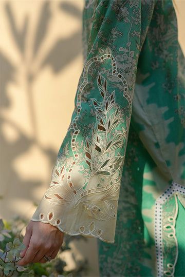 A seafoam lawn base is artfully rendered with a nature inspired print. The kurta is adorned with an embroidered neckline and features intricate cutwork details on scalloped sleeves. Paired with an ikat inspired chiffon dupatta and jacquard culottes. Shifli Kurti Design, Work On Printed Suits, Shifli Embroidery Designs, Cut Work Suit Design, Sleeve Details Ideas, Cutwork Kurti, Cutwork Sleeves Design, Cut Work Designs, Cutwork Dress