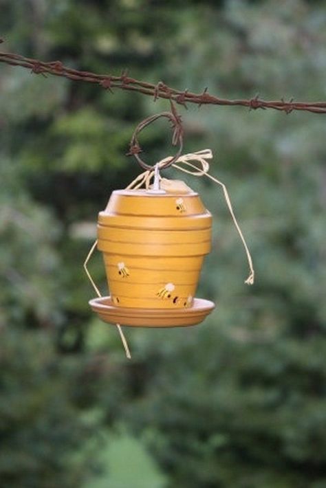 Turn a terra cotta flower pot into a bird feeder | DIY projects for everyone! Bird Feeder Diy, Clay Pot Projects, Flower Pot People, Clay Pot People, Pot People, Pot Art, Flower Pot Art, Terra Cotta Pot, Terra Cotta Pot Crafts