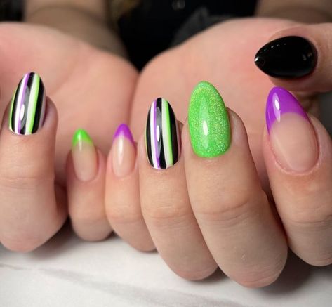 How To Paint Stripes On Nails, Halloween Beetlejuice Nails, Halloween Tip Nails, Easy Beetlejuice Nails, Beetlejuice Nails Almond, Black Nails With Colorful Design, Beetle Juice Nail Art, Beetle Juice Nails Acrylic, Purple Green Halloween Nails