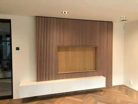 Living Room Rug Under Couch, 75” Tv Wall Design, Termo Wood Design Wall, Wooden Panel Walls Living Rooms, Slats On Wall Living Rooms, Slat Wall Basement, Tv Slat Wall, Slat Tv Wall, Wood Slat Tv Wall