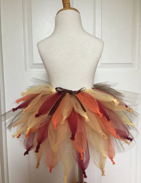 All tutu skirts are custom made to order and will be ready to ship in 1-2 weeks. If you need it sooner please contact me to make sure I can accommodate you.  This tutu is multi-colored and the front and back is both layered to give it a full feather look. The back of the skirt is adorned with a chocolate brown satin bow. This listing is for sizes newborn - size 8. If you need a bigger size please contact me and I will set-up a listing for you.  You choose how long you would like your skirt. Pric Turkey Trot Costume, Thanksgiving Tutu, Make A Tutu, Turkey Costume, Spirit Week Ideas, Baby Tutu Dresses, How To Make Tutu, Tutu Ideas, Halloween Tutu