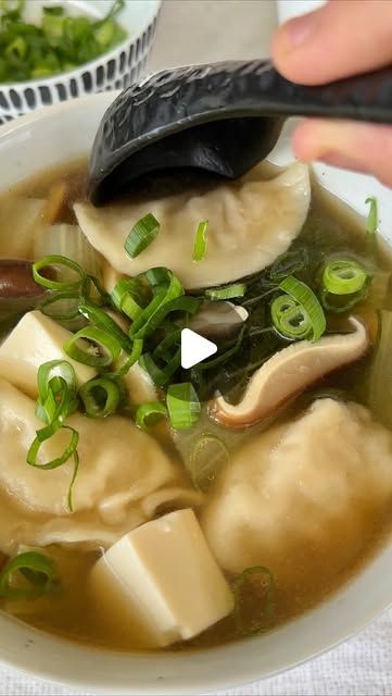 Liz Borgo on Instagram: "Easy Dumpling Soup 🥟

Cooked all in the one pot, this is a super easy weeknight dinner 🔥 

I like using zucchini noddles or ribbons because they don’t require cooking (and help boost plant fibre intake). But you could boil regular noddles in a separate pot and add them in. 

Ingredients - serves 4
~1.5L or 6 cups salt reduced chicken stock
~3 cloves garlic 
~2.5cm piece of fresh ginger 
~450g frozen dumplings (choose your favorite flavour)
~2 bunches bok Choy or other Asian greens
~200g shitake mushrooms or other kind 
~1 tablespoon soy sauce* 
~1 tablespoon sesame oil 
~2 spring onions (green part)
~200g silken tofu (no need to cook it)
~250g zucchini noodles or regular noodles
~OPTIONAL fresh chilli or chilli sauce. 
~NOTES: other veg like baby corn or thin car Asian Greens, Easy Dumplings, Shitake Mushrooms, Dumpling Soup, Frozen Dumplings, Baby Corn, Shitake Mushroom, Ginger Slice, Dumplings For Soup