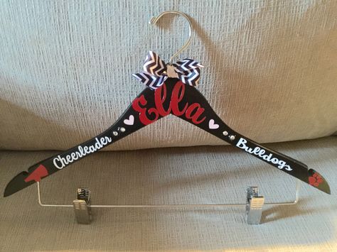 Personalized cheer uniform hanger for sweet, Ella Uniform Hangers Cheer, Cheer Uniform Hangers Diy, Cheer Hangers Diy, Competition Gifts Cheerleading, Cheer Hangers, Cheer Uniform Hanger, Cheer Wall, Cheer Buckets, Youth Cheerleading