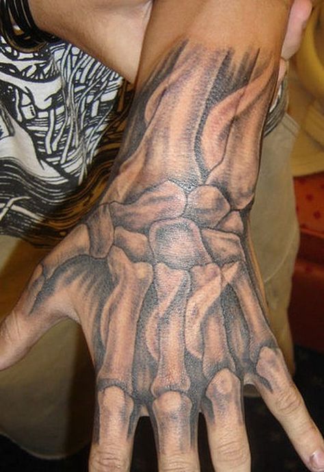 Getting hand tattoos for men is nice, but making the right choice of an artwork is even better. You can have a tattoo anywhere on your body, but if you are looking to make a… Bone Hand Tattoo, Ripped Skin Tattoo, Anatomical Tattoos, Best 3d Tattoos, Anatomy Tattoo, Skeleton Hand Tattoo, Bone Tattoos, Hand Tats, Biomechanical Tattoo