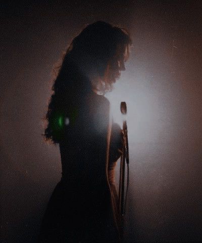 80s Singers Aesthetic, Singing Dark Aesthetic, Vintage Singer Aesthetic, Singing At Home Aesthetic, Lead Singer Aesthetic Female, Lounge Singer Aesthetic, Bar Singer Aesthetic, Singing Aesthetic Vintage, Music Performance Aesthetic