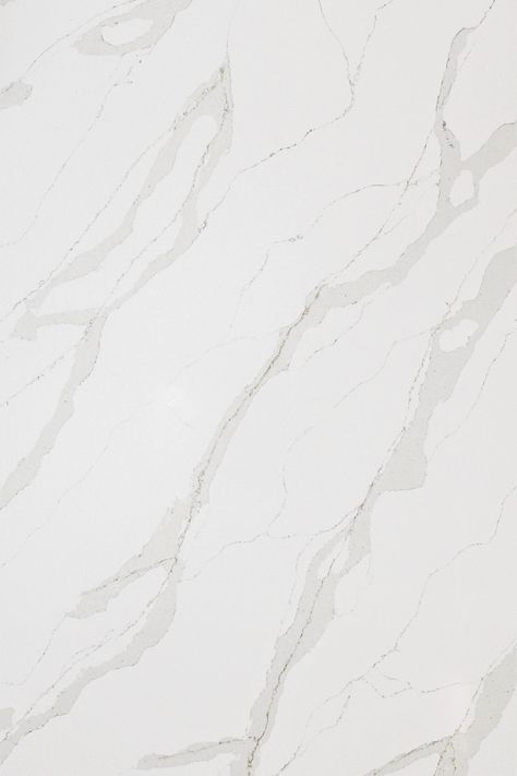 From far away, Calacatta Calypso white quartz might seem ordinary—a bright white background featuring classic grey marble veining in a soothing diagonal motion. Up close however, this white quartz holds a secret. // Category: Quartz / Thickness: 2cm, 3cm / Finishes: Polished / Features: Book-matched White Marble Quartz, French Country Colors, Country Colors, Quartz Marble, Bright White Background, Background Search, Marble Quartz, Quartz Kitchen, Calacatta Marble