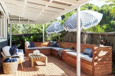 Undercover seating means the outdoor area can be used rain, hail or shine. Exterior Bench, Bay Cottage, Outdoors Indoors, Side Yards, Luxury Holiday, Side Yard, Studio Ideas, Outdoor Deck, Bench Seat