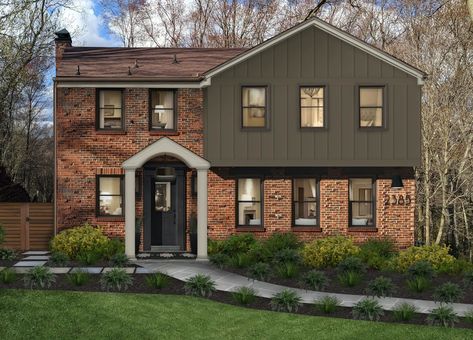 James Hardie's Hardie Board siding in Timber Bark is one of our designers' favorite home exterior colors for 2021. Learn more about why we love Hardie Board and which colors we've been digging most in this article. #exteriordesign #JamesHardie #HardieBoard #curbappeal #siding #homeexterior Timberbark Hardie Exterior Colors, Brick House With Dark Siding, James Hardie Timber Bark Siding, Vertical Siding Exterior With Brick, Timber Bark Hardie Siding, Brick Siding Combinations, Brick And Hardie Board Exterior, Siding Colors For Houses With Brick, Brick And Siding Exterior Combinations