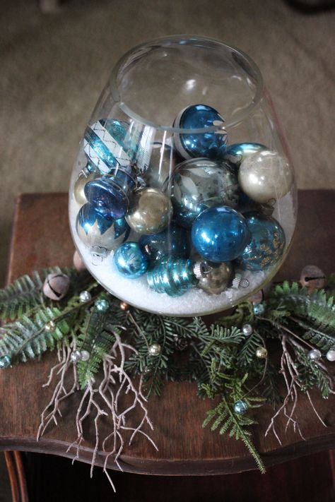 Mercury Glass balls from Poland, in blue and silver. Displayed in a large brandy snifter with faux snow Brandy Glass Ideas, Brandy Snifter Centerpiece, Blue Christmas Decorations, Brandy Snifter, Chestnuts Roasting, Mercury Glass Christmas Tree, Brandy Glass, Winter Centerpieces, Blue Christmas Decor