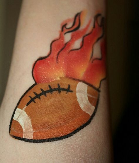 Football w/flames, sm or lrg cheek design Football Face Paint, Tattoo Aftercare Tips, Festival Paint, Face Painting For Boys, Football Tattoo, Latest Tattoo Design, Leg Painting, New Tattoo Designs, Arm Art