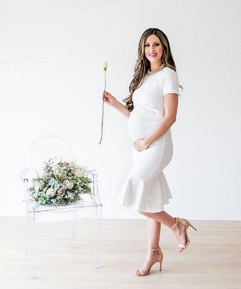 Elegant, stylish white dress perfect for your #babyshower, #babymoon, #wedding or #maternityphotoshoot  Sleek cap sleeves with a flare skirt - it is sure to confidently show off that adorable baby bump! Gender Reveal Dress Pink And Blue, Gender Reveal Dresses For Mom, Casual Maternity Dresses, Stylish White Dress, Gender Reveal Dress, White Flare Dress, Maternity Stores, Cream Sweater Dress, Stages Of Pregnancy