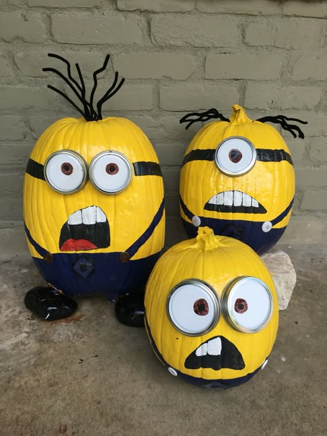 Minon Pumpkin Painting, Despicable Me Pumpkins, Disguised Pumpkin Project, Plastic Pumkin Decoration Ideas Easy, Minions Pumpkins Painting, Painted Frankenstein Pumpkin, Pumpkin Painting Ideas Minions, Minions Halloween Decorations, Yellow Pumpkin Painting Ideas