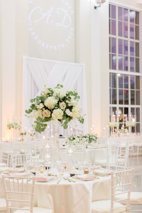 Classic Wedding Reception and Decor, White Criss Cross Draping and Custom Monogram Gobo Light as Backdrop for Sweetheart Table, Lush Greenery Eucalyptus, Ivory Hydrangeas, Blush Pink Roses on Crystal Tall Vase, Ivory Linens | Downtown Tampa Wedding Venue The Vault | Florida Wedding Planner Breezin' Weddings Classic Wedding Reception, Tampa Wedding Venue, Blush Pink Roses, Wedding Design Inspiration, Crystal Candelabra, Historic Wedding, Tampa Wedding, Wedding Vendor, Local Wedding