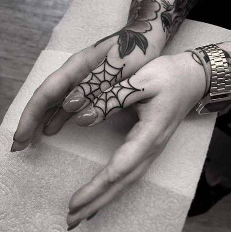 Symmetrical spider web tattoo on the thumb done by @art.tattoos | www.otziapp.com Spider Hand Tattoo, Rad Tattoos, Hand Ideas, Spider Web Tattoo, Web Tattoo, Hand Doodles, Tattoo Designs For Girls, Bee Tattoo, Tattoo Flash Art