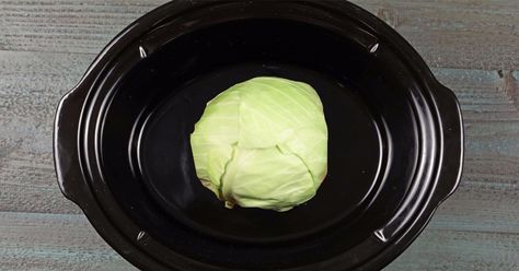 Place whole cabbage at center of slow cooker & get ready to enjoy a scrumptious meal Whole Cabbage Recipes, How To Cook Cabbage In Crockpot, Keto Cabbage Recipes Crock Pot, Whole Cabbage In Crockpot, Crockpot Cabbage With Bacon, Slow Cooker Garlic Parmesan Cabbage, Slow Cooker Whole Cabbage With Ham, Ham And Cabbage Recipe, Cabbage Slow Cooker