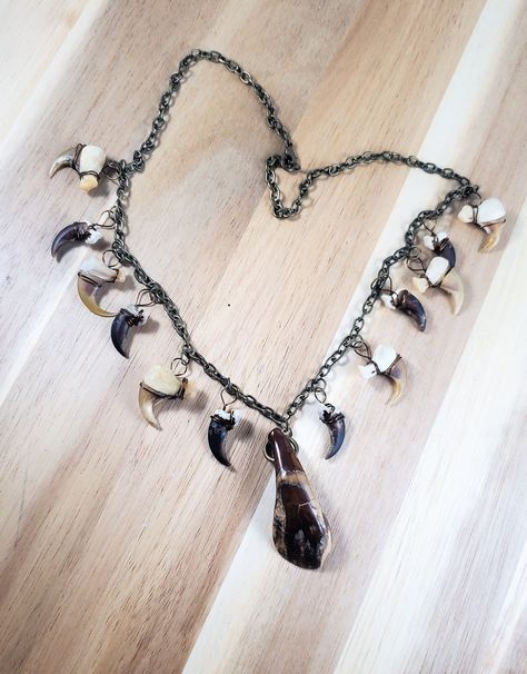 Excited to share the latest addition to my #etsy shop: 20" Buffalo Tooth, Bobcat Claw, and Coyote Claw Necklace with Bronze Findings, Real Vulture Culture Animal Bones #unisexadults #bonehorn #hunter #dnd #barbarian #gnoll #viking #oddity #curiosity https://etsy.me/3puOzUh Dnd Night, Dnd Barbarian, Claw Jewelry, Claw Necklace, Vulture Culture, Xmas Wishes, Bone Horn, Animal Bones, Matching Earrings