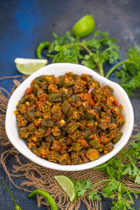 Bhindi Bhaji (Bhendi Chi Bhaji) is a Maharashtrian-style okra stir fry. This vegan and gluten-free sabji comes together in under 30 minutes and is super easy and simple to make. How To Cook Okra, Okra And Tomatoes, Bhaji Recipe, Indian Diet, Dried Vegetables, Indian Dessert Recipes, Shimla, Middle Eastern Recipes, Veg Recipes