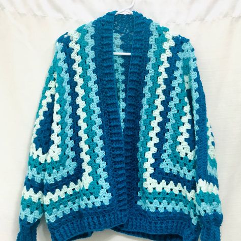 This handmade crochet cardigan is made to be oversized and cozy! Fits sizes Med to XXL comfortably. The colors are bright and vibrant and will add style to any outfit.  Ready to ship! *free shipping nationwide* Hexi Cardi Crochet, Blue Crochet Cardigan, Kimono Crochet, Hexagon Cardigan, Crochet Wearables, Crochet Hexagon, Crochet Design Pattern, Crochet Inspo, Crochet Clothing