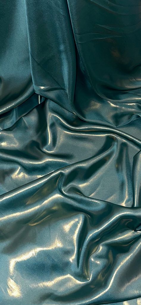 Our shimmer satin has a superior drape like no other. This luxurious fabric has a soft touch and glows beautifully creating a perfect blend between the shimmer and satin. Perfect for all types of dressmaking, crafting, decorating and various other projects.  *Colours may vary due to different screens.  *Width 58 inches *Synthetic *Machine Washable *If you order more than 1 meter, fabric will come as one continuous length. *Fast Delivery Before you go please check out our other items. We offer combined postage and special delivery. Lastly, we would appreciate if you can leave us feedback once items are received. Thank you. Drape Aesthetic, Luxury Material Board, Types Of Clothes Fabrics, Satin Aesthetic, Fabrics Texture, Teal Aesthetic, Room Box Miniatures, Turquoise Fabric, Jewel Colors