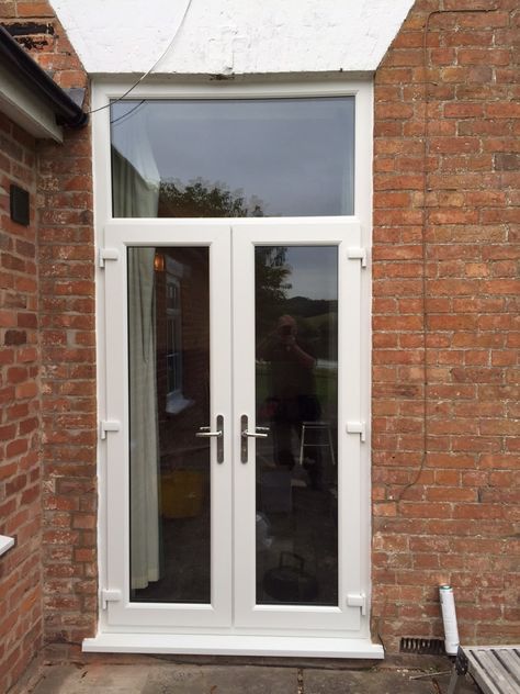 White uPVC French doors with 'A' rated double glazed units. Upvc Patio Doors, French Doors White, Upvc French Doors, External French Doors, Kerb Appeal, White Windows, Greater Manchester, Garden Doors, White Gardens