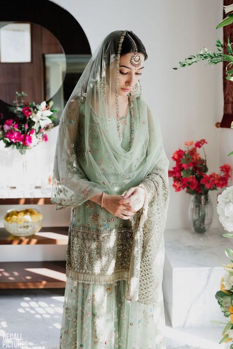 Photo of A coy bride to be at her roka ceremony, dressed in a pastel green sharara भारतीय दुल्हन संबंधी, Green Sharara, Sangeet Outfit, Ceremony Dresses, Green Gown, Pakistani Bridal Wear, Pakistani Wedding Dresses, Engagement Dresses, Pakistani Bridal