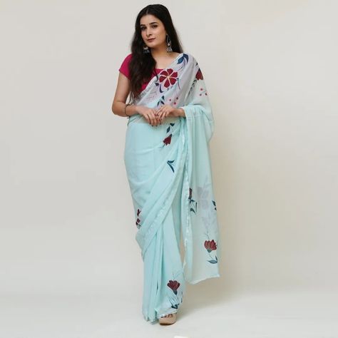 Elevate your style to new heights with our enchanting sky blue georgette saree, hand-painted with vibrant red flowers. #HandpaintedSilkSaree #handcrafted #handpaintedsaree #saree #sareelove #trending #skyblue #georgettesaree #sareelover #flowers #flowerprints #fahshionista #FashionArt Blue Georgette Saree, Georgette Saree, Georgette Sarees, Elevate Your Style, Vibrant Red, Red Flowers, Flower Prints, Silk Sarees, Sky Blue