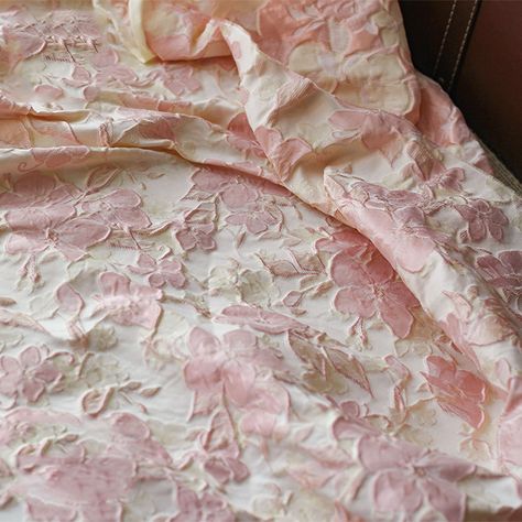 This is a  lovely pink jacquard fabric with a beautiful floral embossed design. It is designed specifically for making dress, curtains, upholstery, or any other high-end textile project. Width:63inches/160cm The listing is for 1 yard, for more quantity, we will send you an uncut piece. If purchase more, please feel free to contact us for a wholesale price❤ Disclaimer of Photos: The photo may differ from the actual product due to reproduction limitations of the photograph and limitations of viewing photos at different resolutions, hue, brightness, contrast, and other screen variations. Due to these limitations, photos may not provide a perfect match to the actual product received. Please convo us if you have any questions. Enjoy shopping : ) Pink Jacquard Dress, Pink Upholstery Fabric, Dress Curtains, Embossed Fabric, Textiles Projects, Damask Fabric, Brocade Dresses, Embossed Design, Pretty Fabric