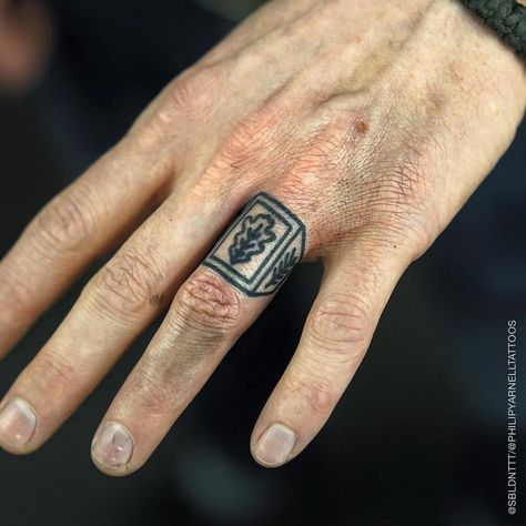 Ring TTT by @philipyarnelltattoos Finger Ring Tattoo, Simple Tattoo Fonts, Moomin Tattoo, Geometric Wolf Tattoo, Traditional Ring, Ring Tattoo, Cross Tattoos For Women, Tattoo Wedding Rings, Ring Finger Tattoos