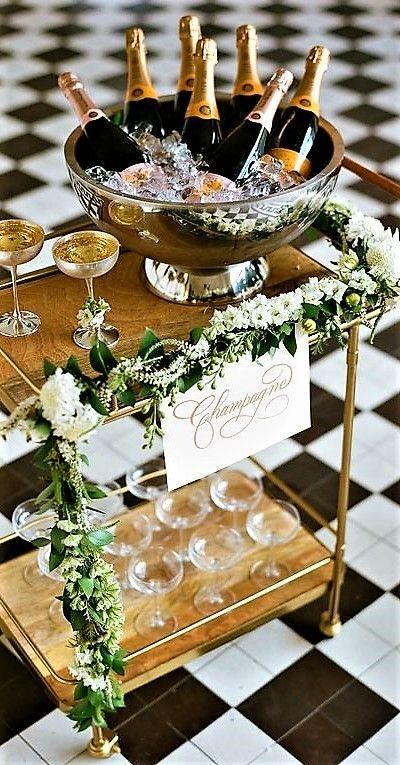 image Wedding Bar Cart, Katering Pernikahan, Decoration Buffet, Winter Bridal Showers, Cocktail Hour Wedding, Red Bouquet Wedding, Bar Cart Styling, Champagne Bar, Asheville Wedding